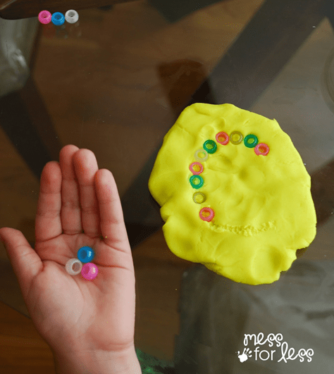 Playing with dough to improve fine motor skills