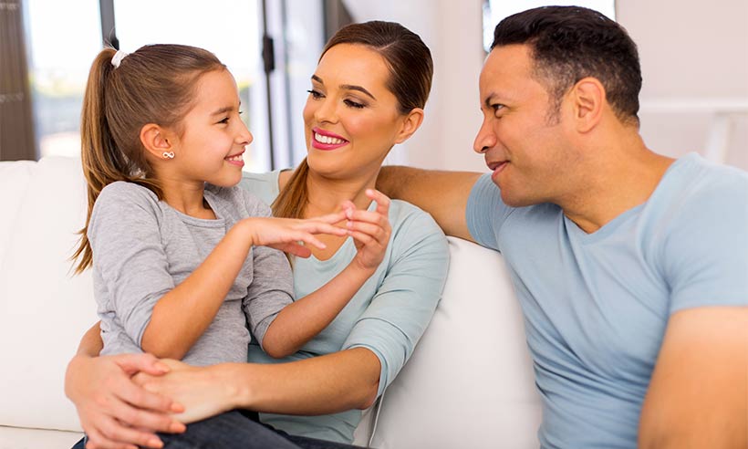 Parents talking with their daughter